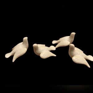Vintage porcelain doves.